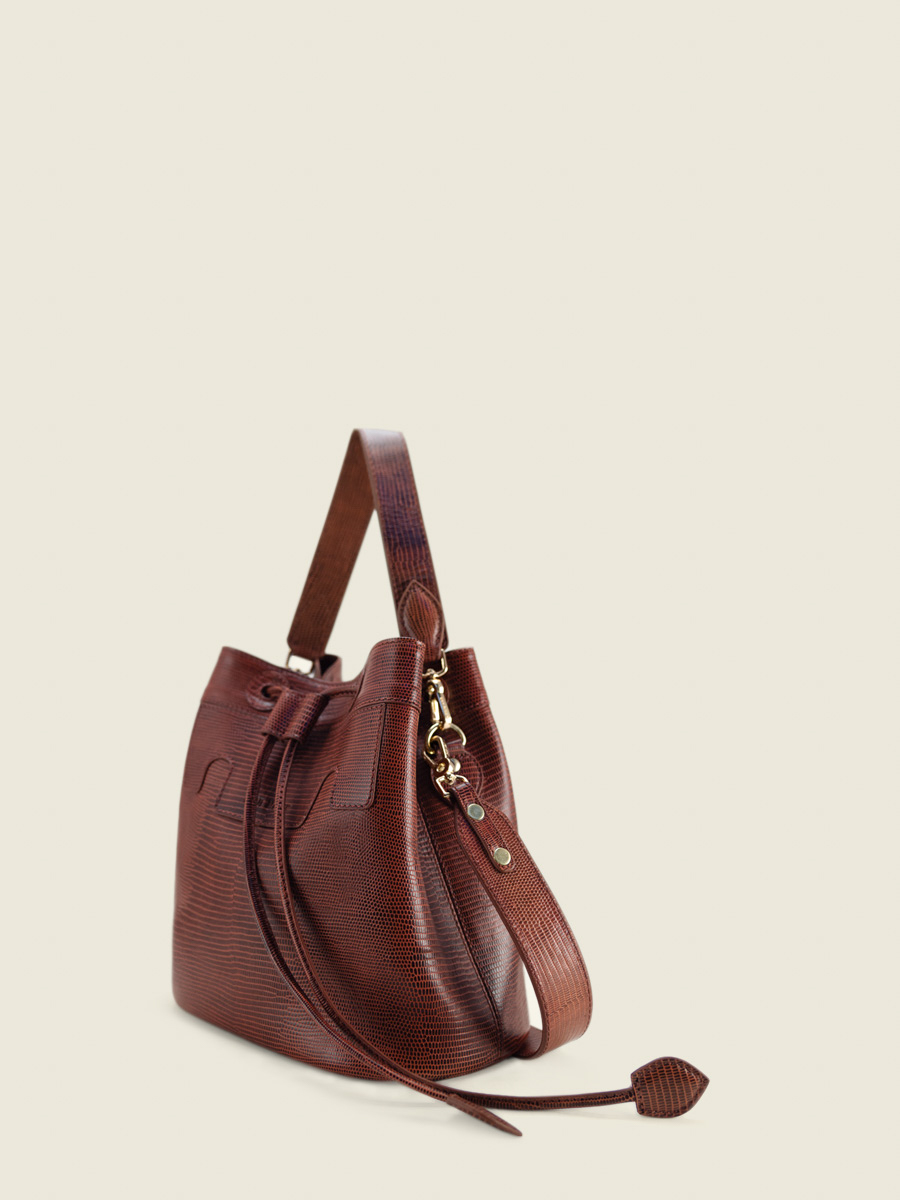 foto-vista-laterale-borsa-a-secchiello-in-pelle-rossa-capucine-1960-paul-marius-w39-l-r