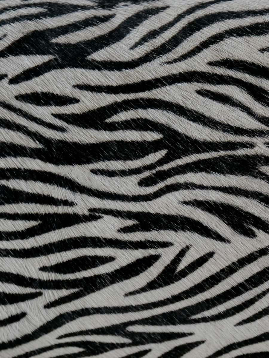 foto-materiale-pochette-in-pelle-da-donna-adele-zebre-paul-marius-